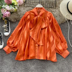Lantern sleeve western style mid-length top