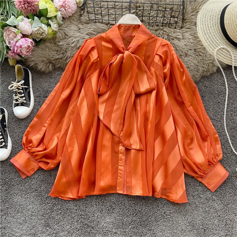 Lantern sleeve western style mid-length top